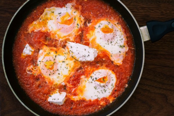Shakshuka is the traditional breakfast fare in Israel. It reminded me of western-style huevos rancheros since it involved a mix of peppers, tomatoes and coriander served hot as a nest for the eggs to cook in. One of the most popular ways to eat breakfast in Israel is to go for an Israeli buffet breakfast; this way you’ll be served the shakshuka and get to try everything on the side too. GF