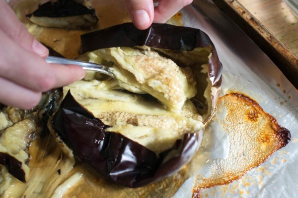 Aubergine, or eggplant, is a core dish of Israeli cuisine. Whether it’s tahini-laced, smoked, lined with yogurt or some sort of mixture of all three, you’ll find it in any traditional Israeli breakfast, and most likely lunch and dinner too. Eggplant can be served as a delight in itself (just char the skins), but in Israel, you’ll often see it served in baba ganoush as well. This is simply aubergine mixed with tahini, lemon juice, garlic and whatever other flavors you want to add. It’s served with bread of course. GF