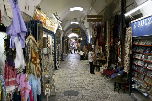 A narrow walkway through a market in Jerusalem